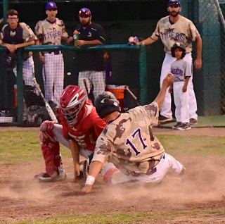 Bristol Hitchman safe at home in 3-1 win over Hanford Tuesday night (May 10).